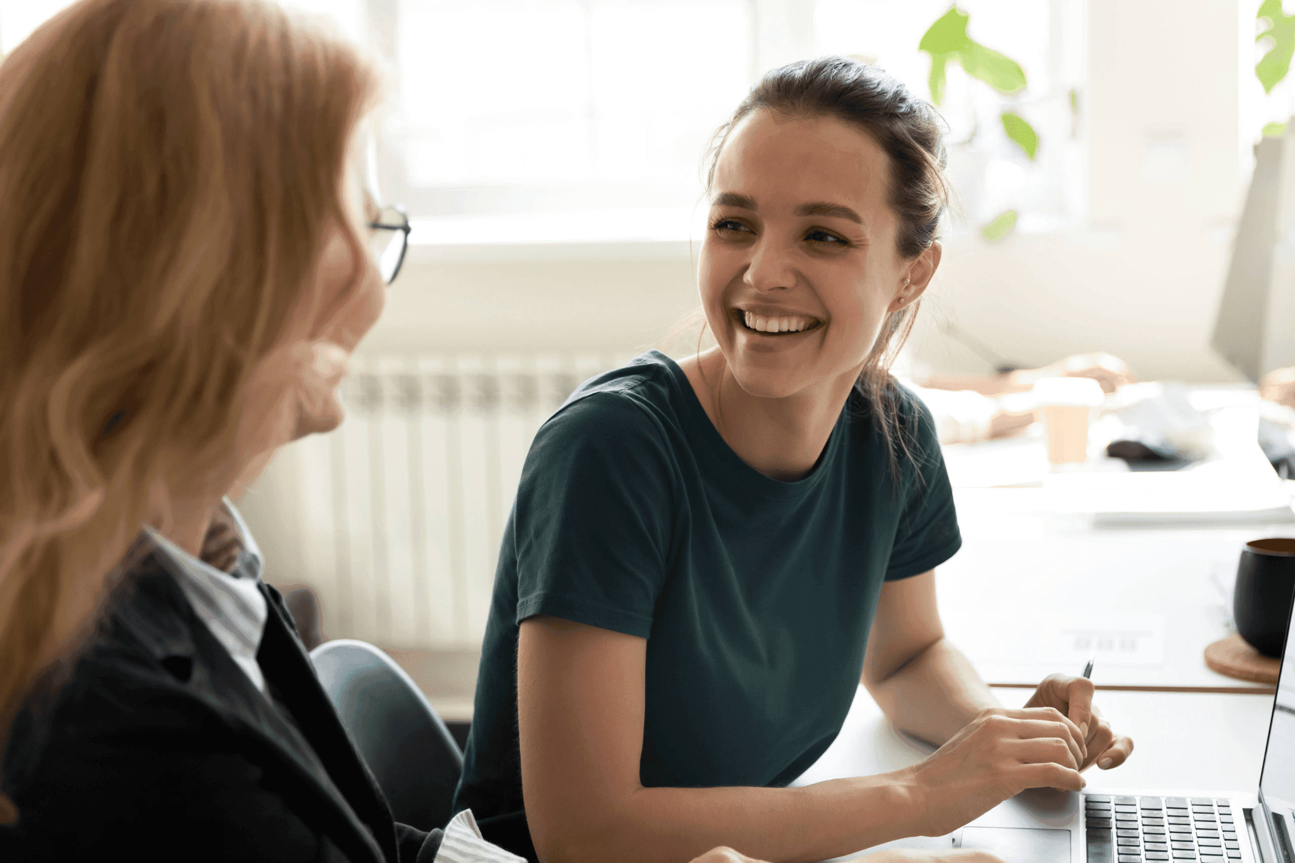 A woman talking with a healthcare professional